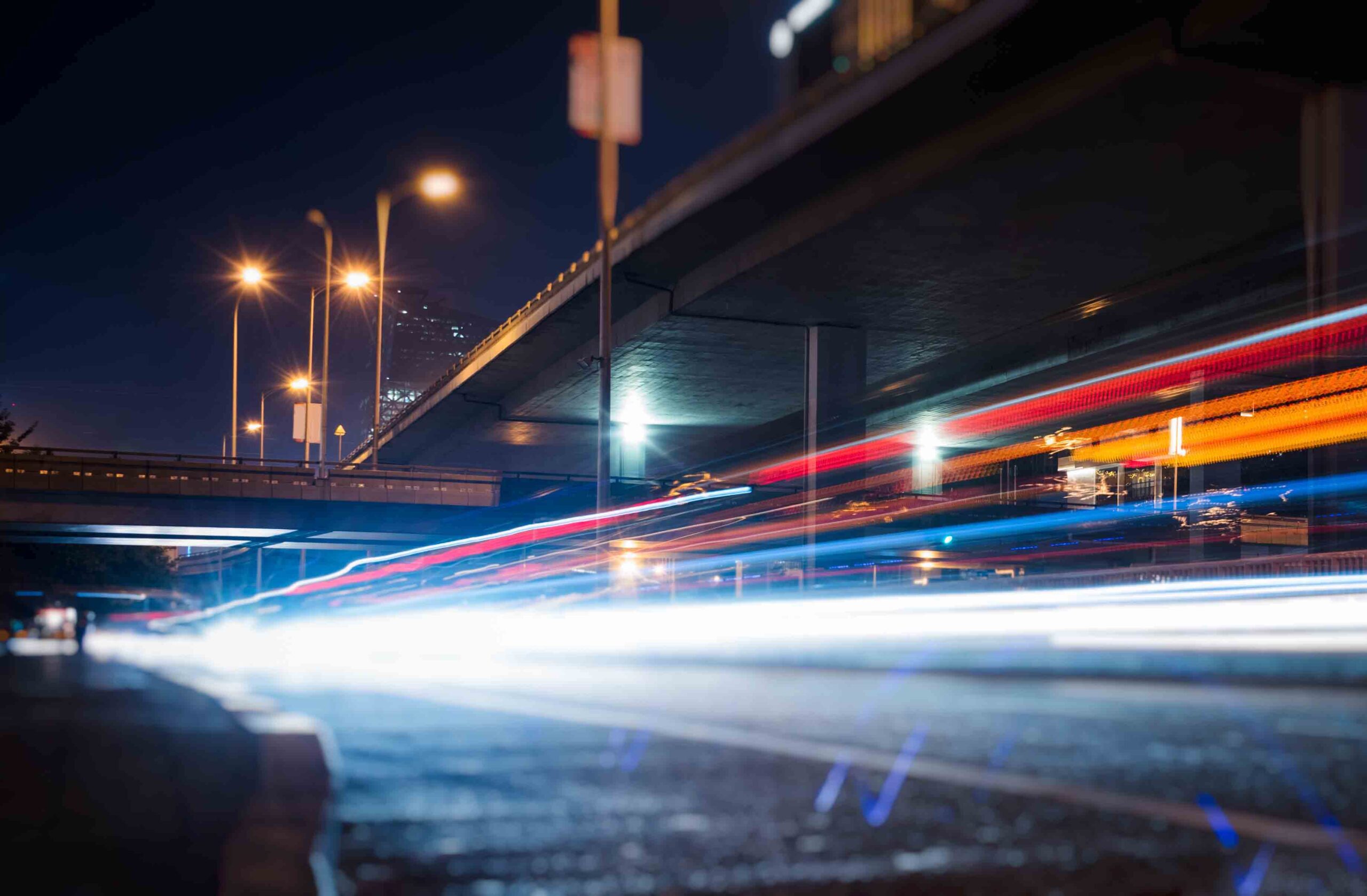 traffic light trails on urban street in city of China.